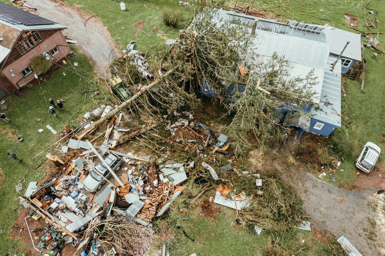 Aerial view of a destroyed house and debris